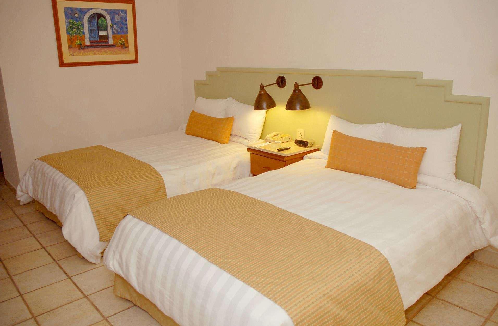 Hotel Emporio Ixtapa à Ixtapa  Extérieur photo A bedroom at the hotel